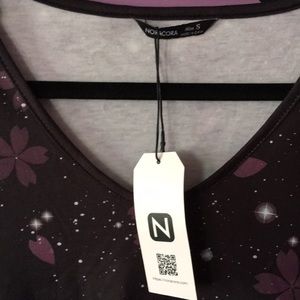 Noracora new with tags size small and never worn before, Celestial flowers new